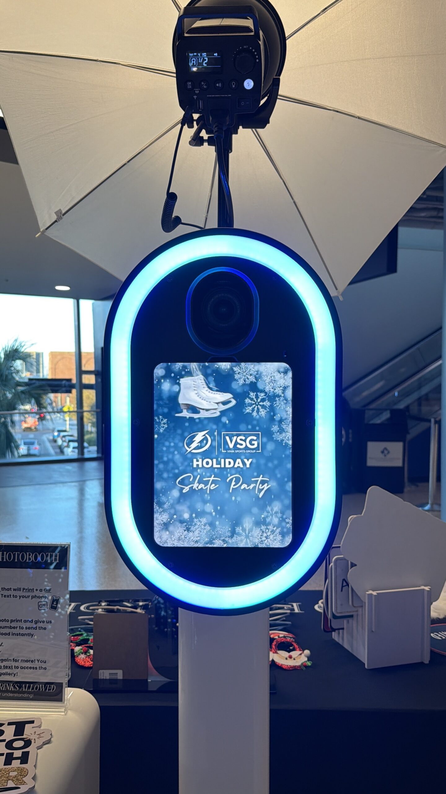 People Posing in a Photo Booth at tampa bay florida benchmark arena