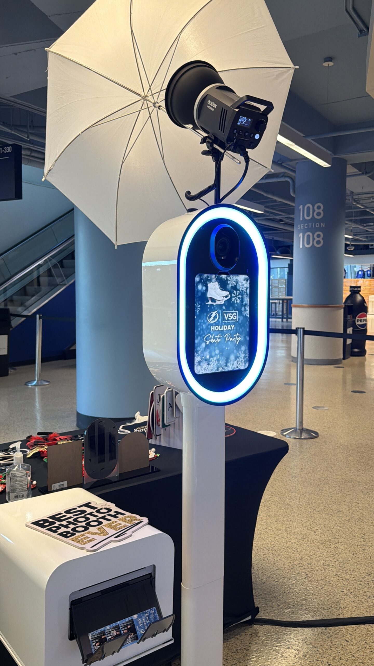 People Posing in a Photo Booth at tampa bay florida benchmark arena