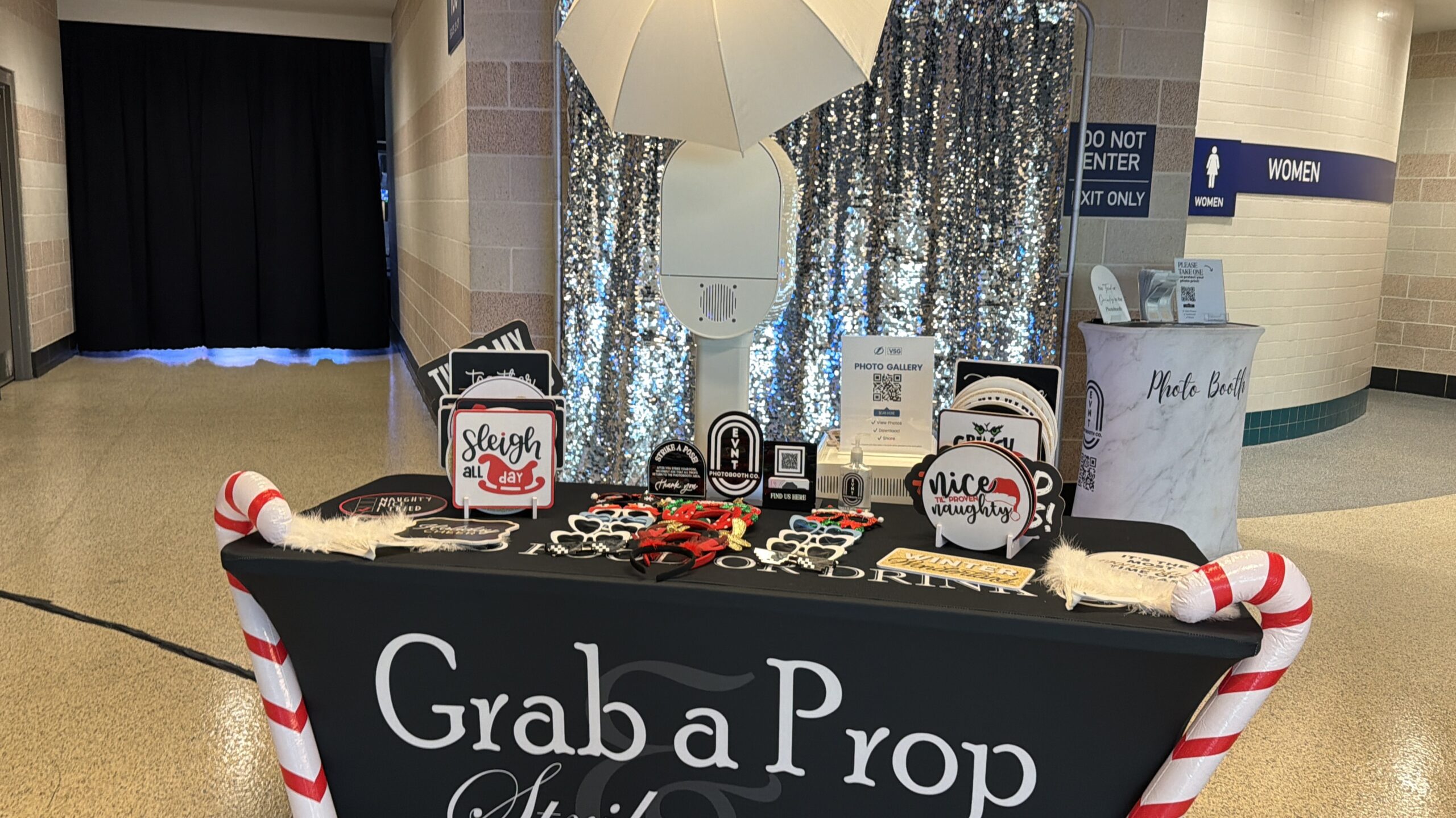 People Posing in a Photo Booth at tampa bay florida benchmark arena