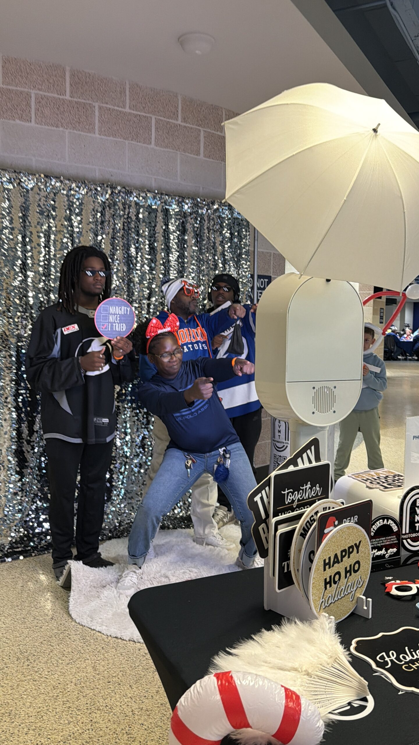 People Posing in a Photo Booth at tampa bay florida benchmark arena