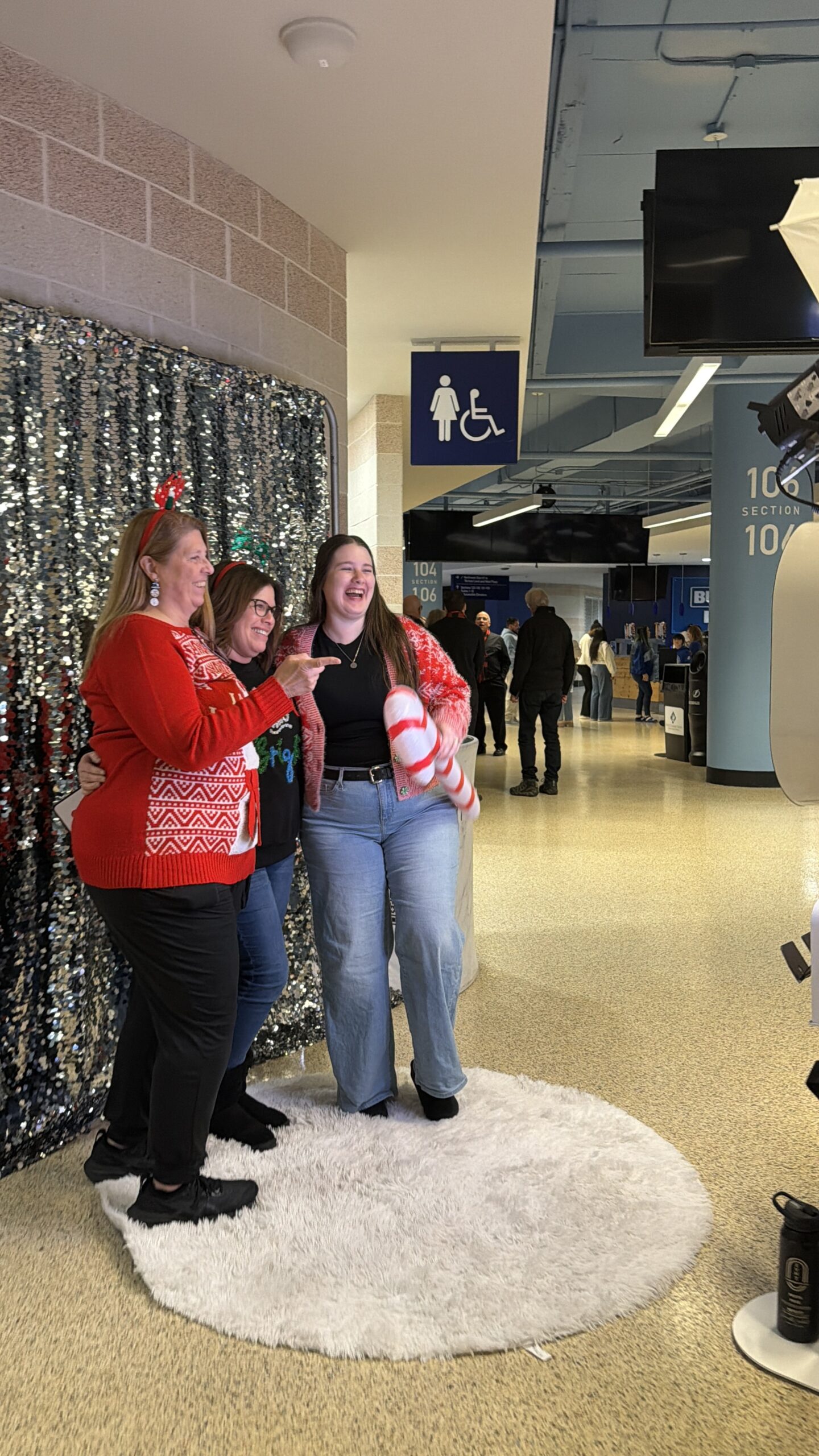People Posing in a Photo Booth at tampa bay florida benchmark arena