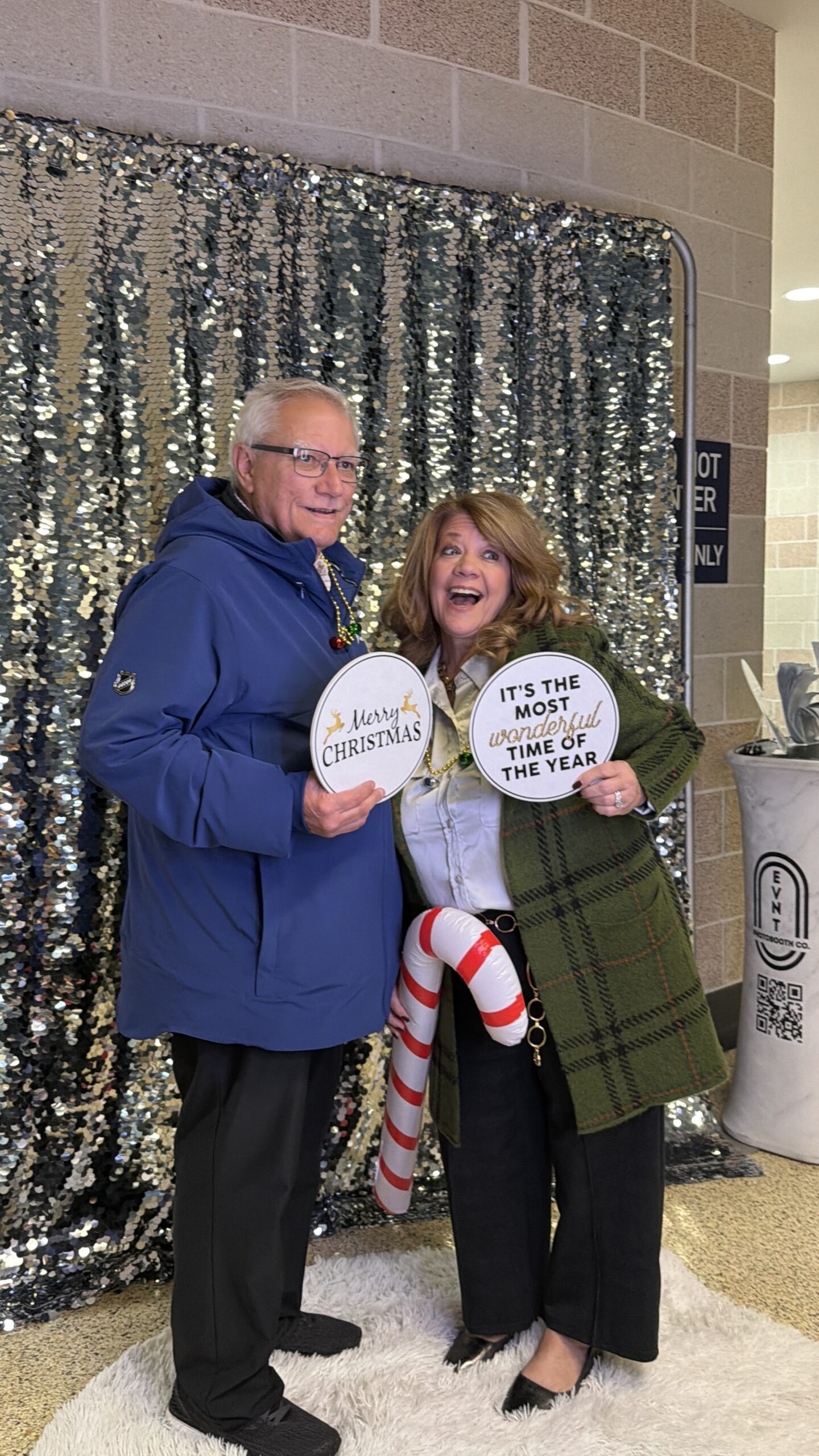 People Posing in a Photo Booth at tampa bay florida benchmark arena