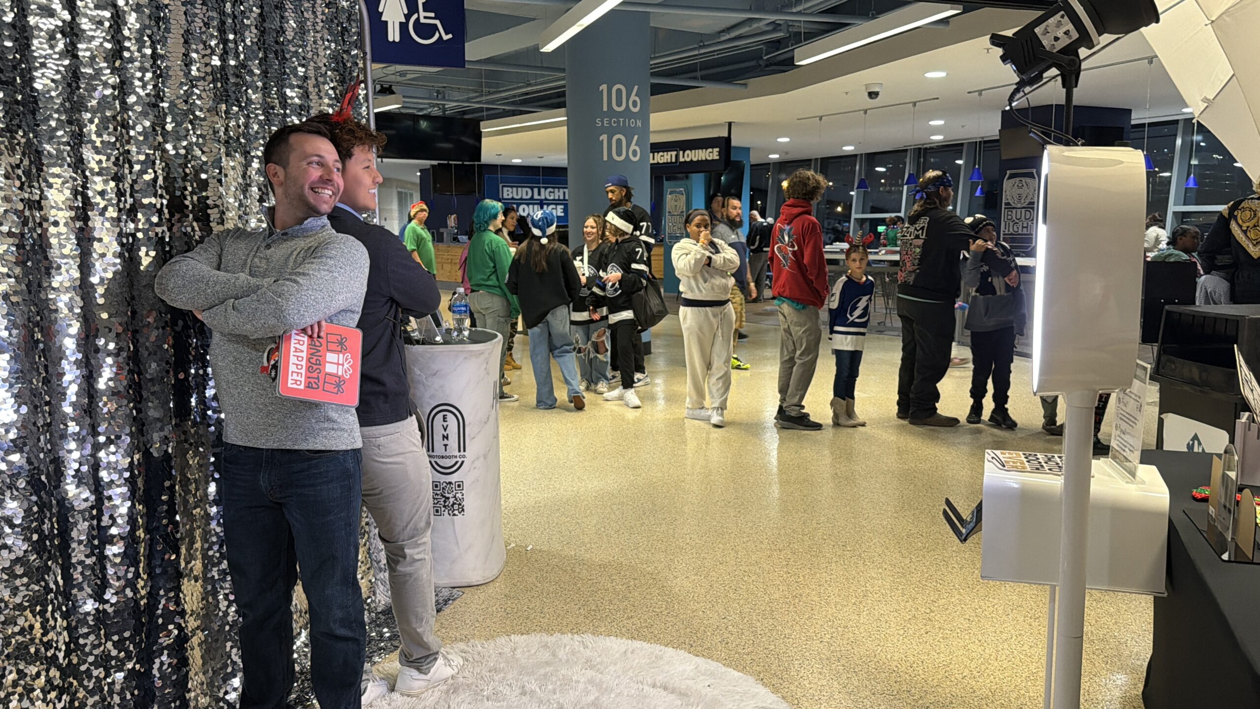 People Posing in a Photo Booth at tampa bay florida benchmark arena