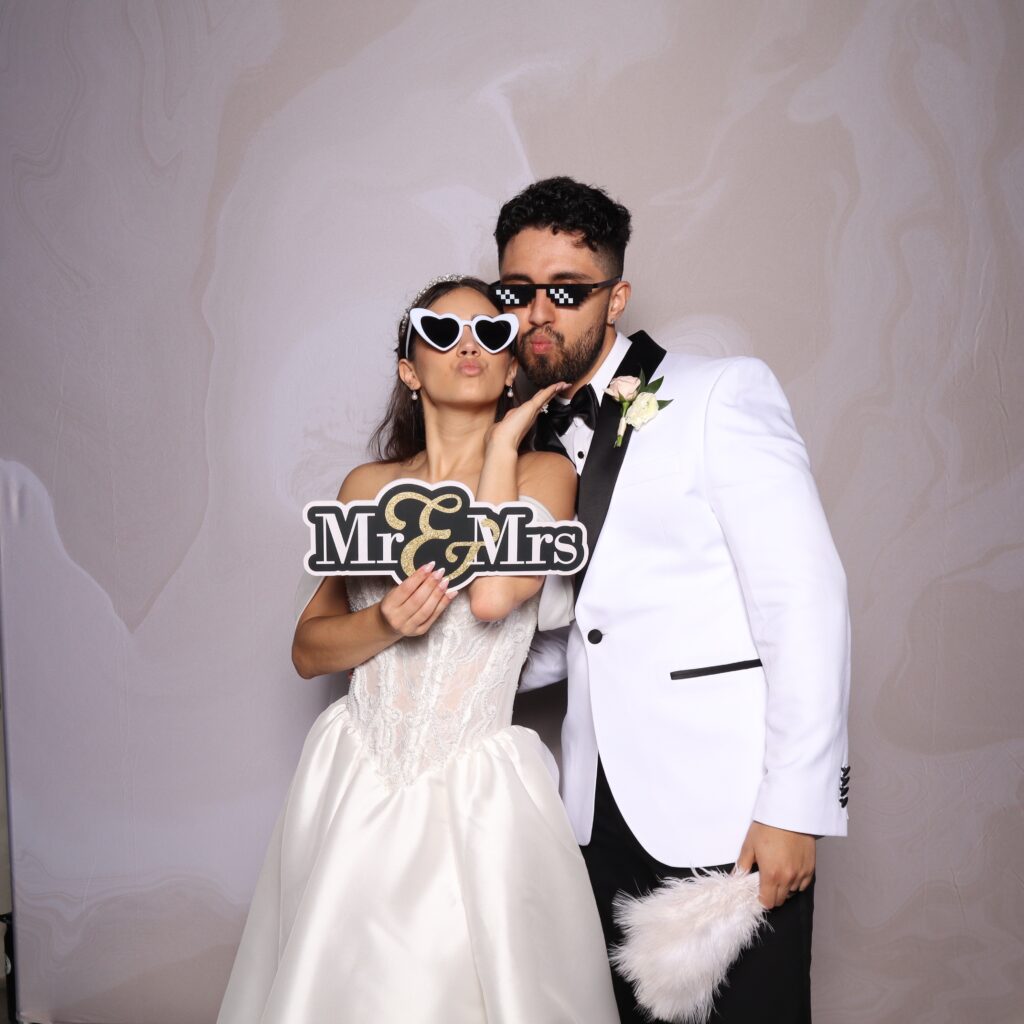 couple posing in Photo Booth rental at white rock canyon in florida