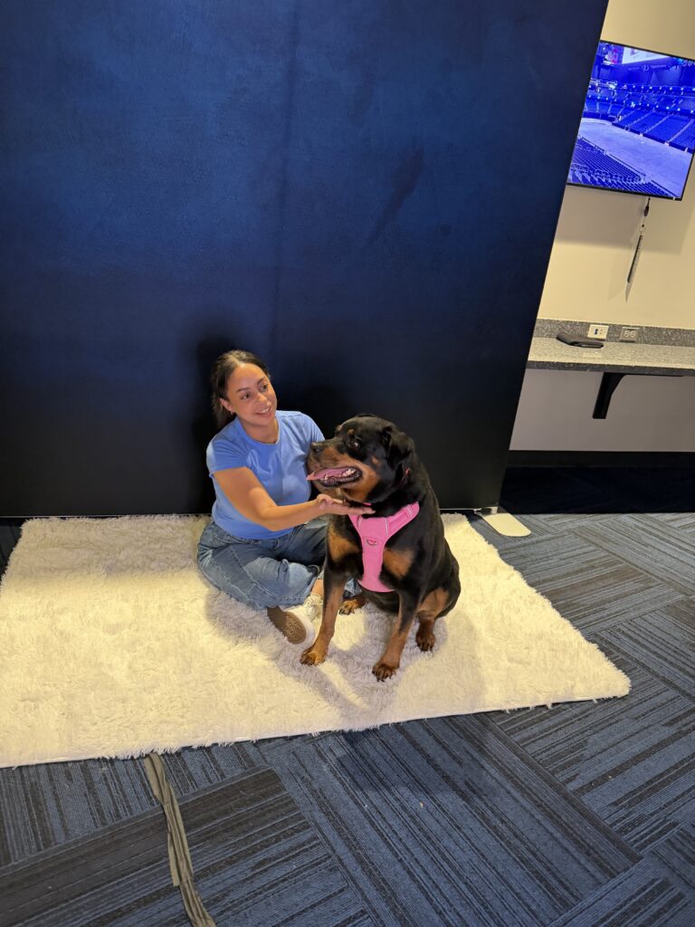 key chain Photo Booth station in Tampa Bay woman posing with dog
