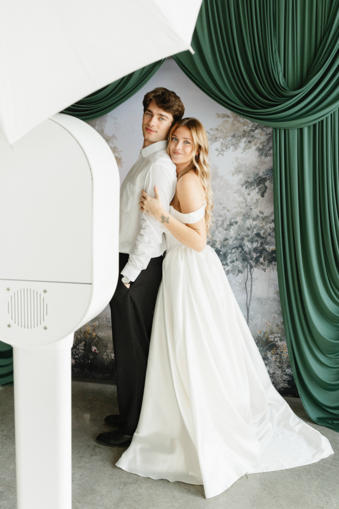 bride and groom in Photo Booth in tampa wedding rental Photo Booth