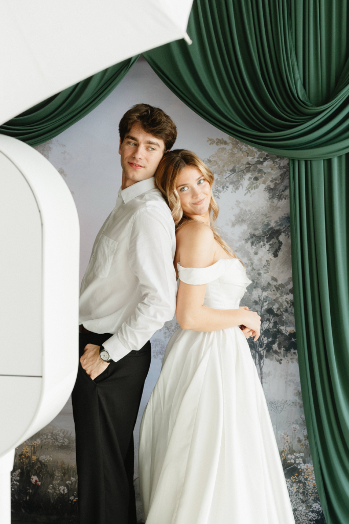 bride and groom in Photo Booth in tampa wedding rental Photo Booth
