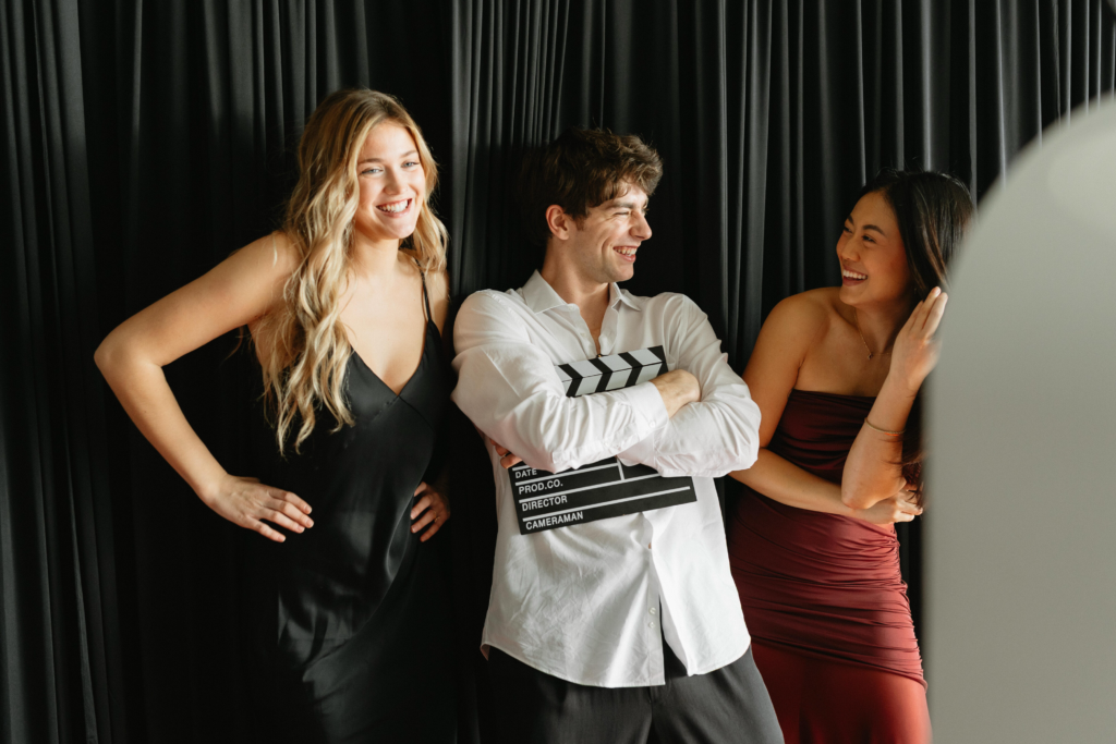 posing in Photo Booth rental in tampa bay florida at event with props