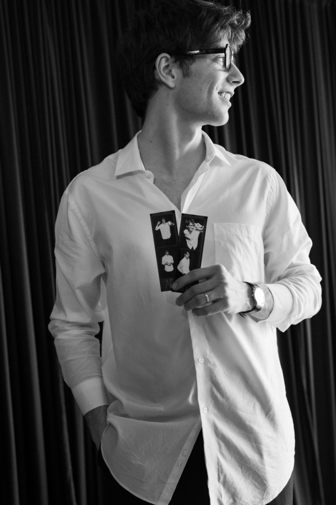 posing in Photo Booth with Photo Booth prints at event in tampa bay fl